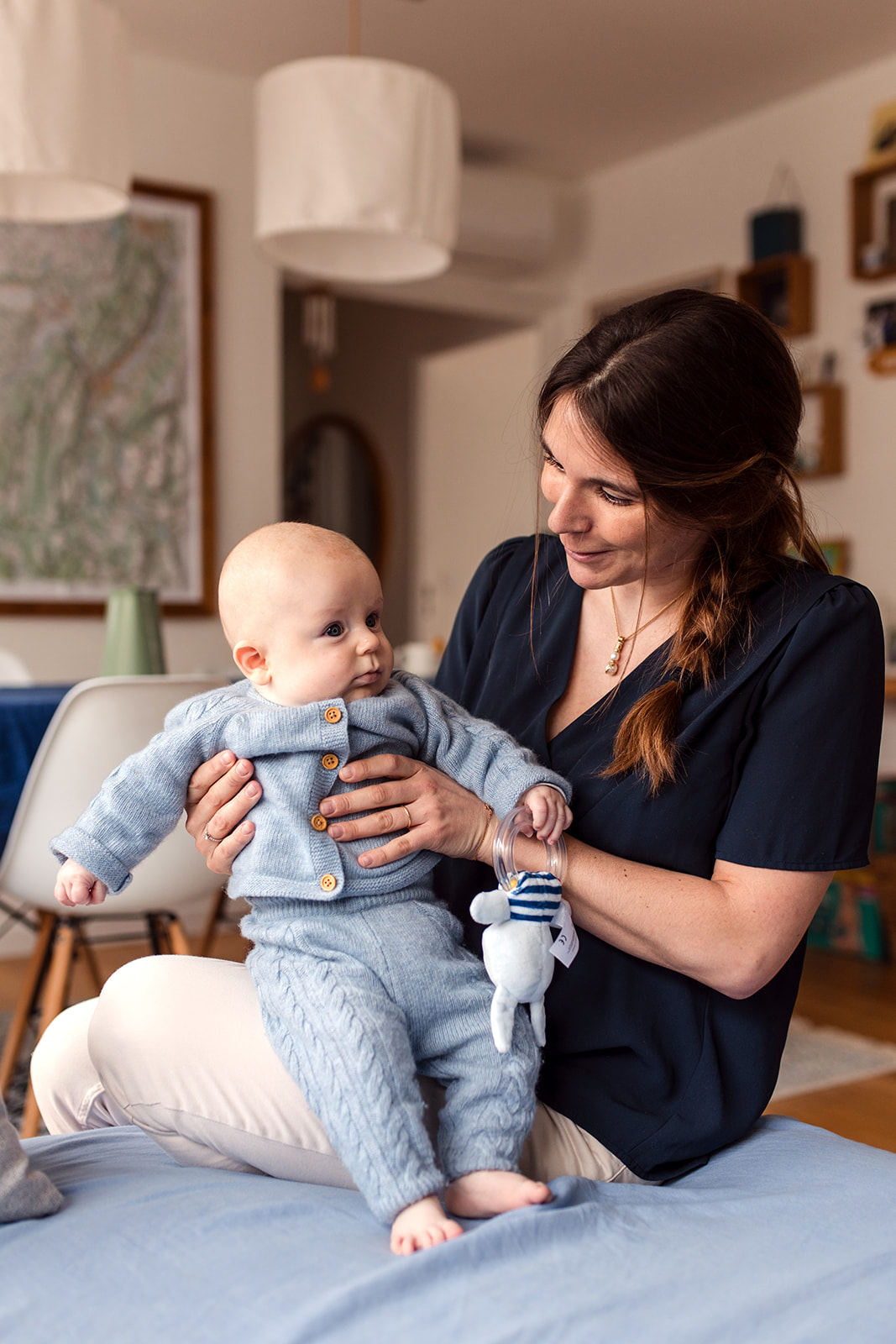 a mother with her baby in her home