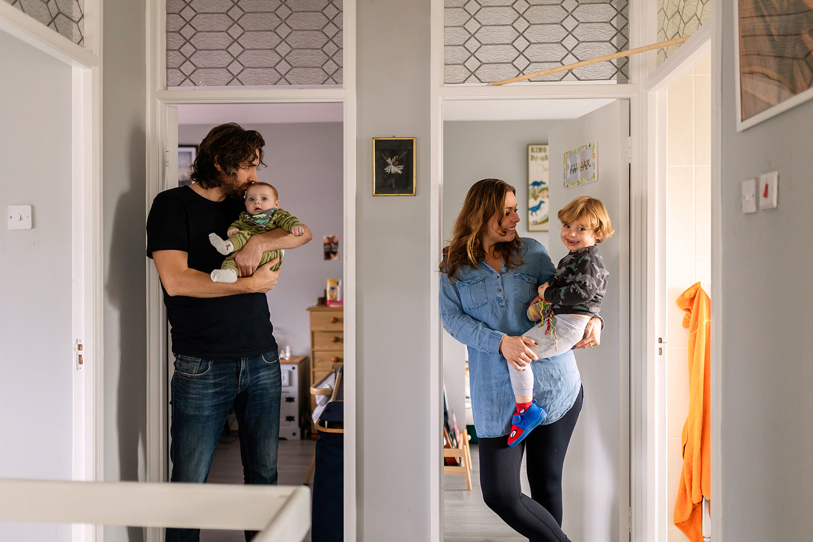 a family standing in their home