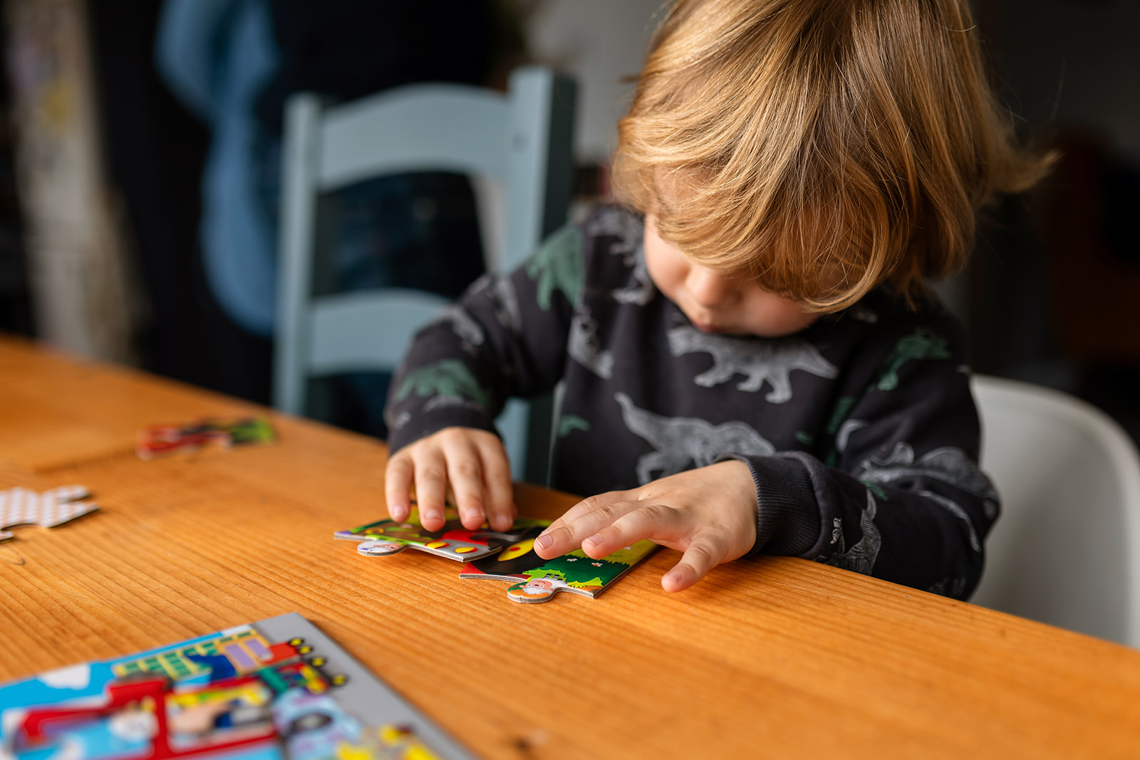 toddler playing with a puzzle