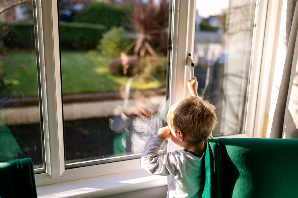 a child looking out the window