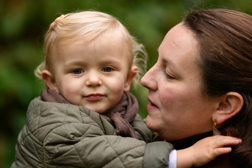 a mother and her baby at the park