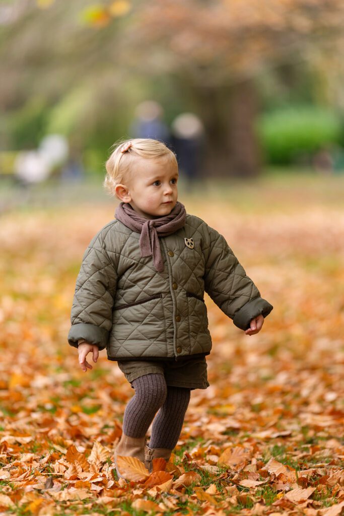 little girl walking in the park during a Saint Stephen's Green family photo session