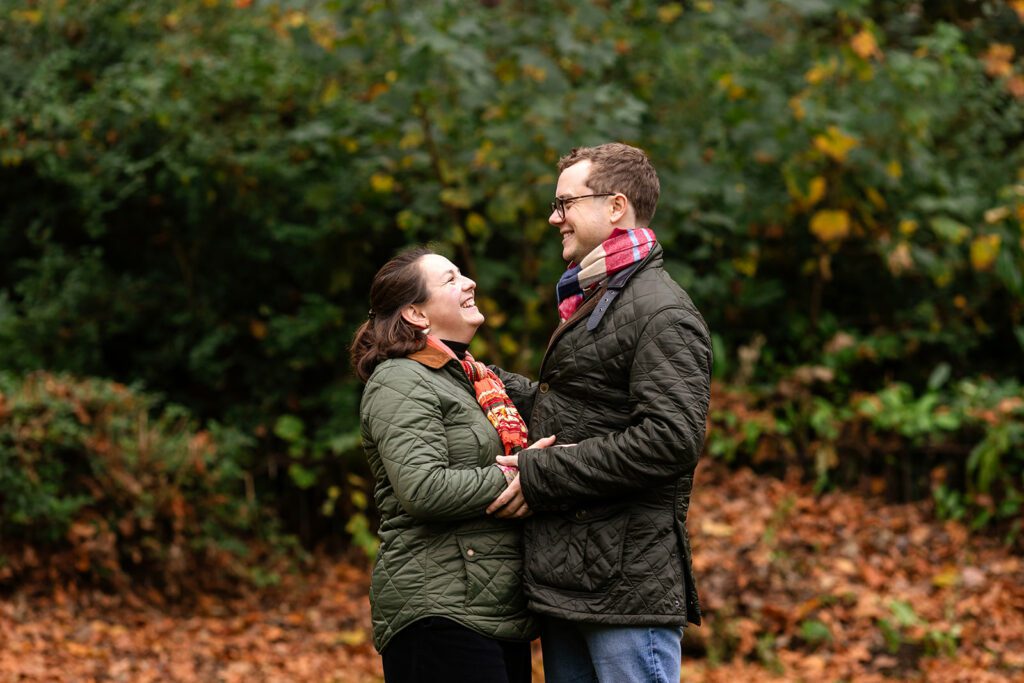 parents smiling at each other during a Saint Stephen's Green family photo session