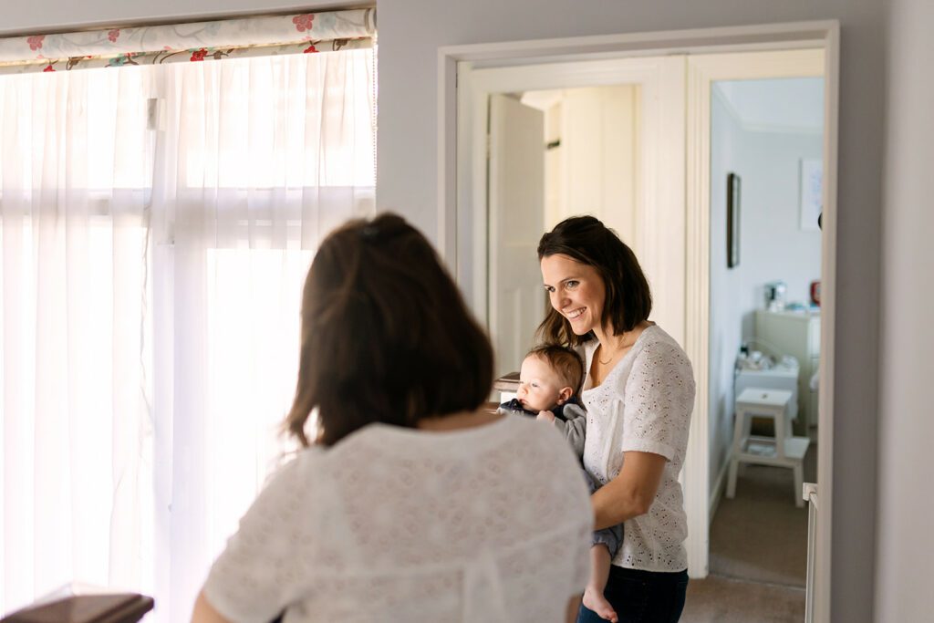a mum and her baby in her home