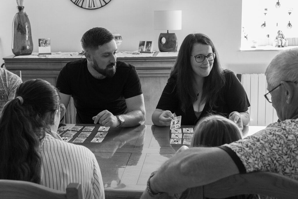 family playing board games at home, fun family activities for your next photo session