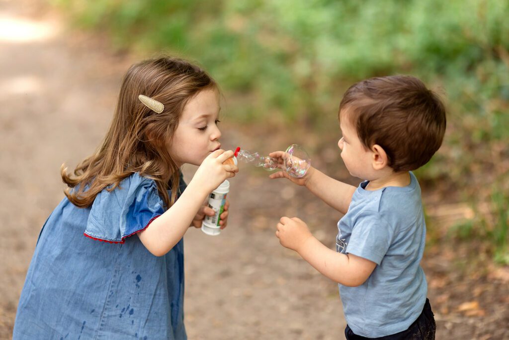 kids blowing bubbles