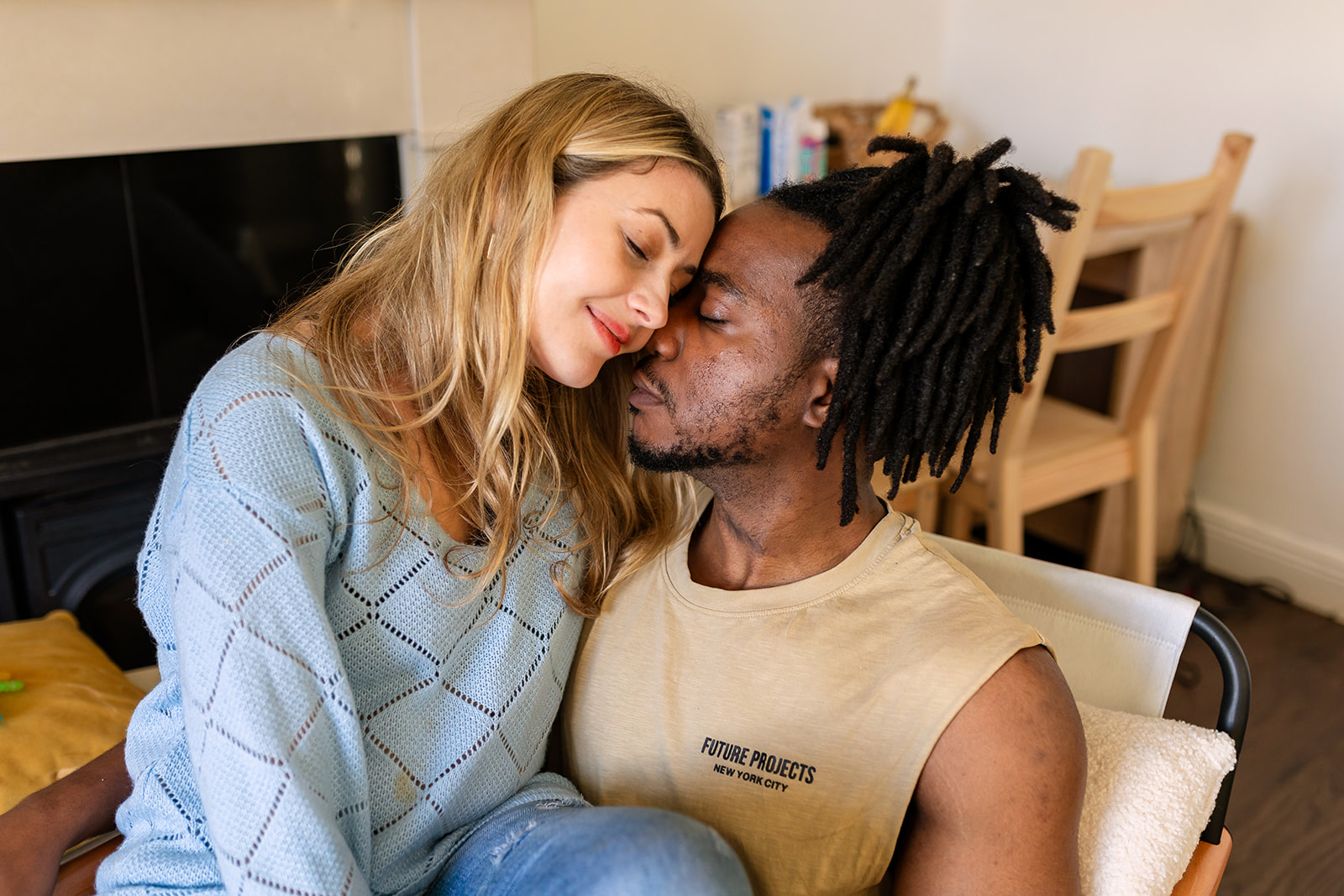 couple cuddling at home for Romantic couple shots in your family photoshoot