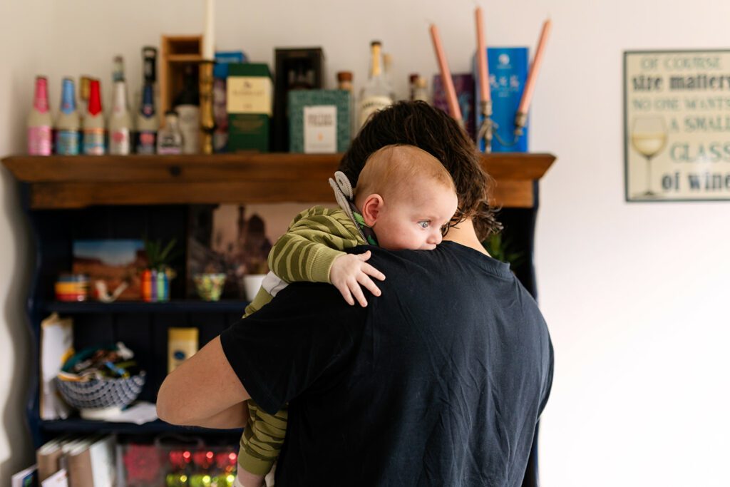 father holding his baby