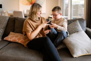 mom playing with son at home
