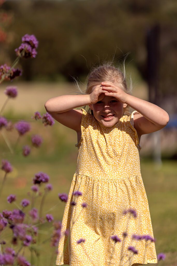Best time of day for a family photo shoot, little girl in her garden