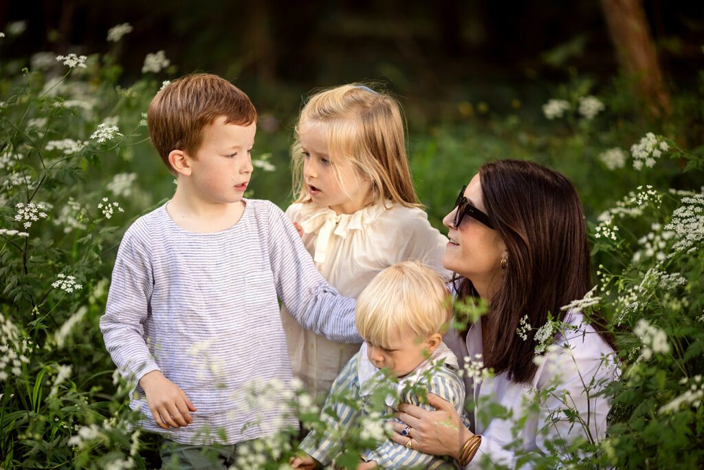 mom posing with her kids in a Dublin park