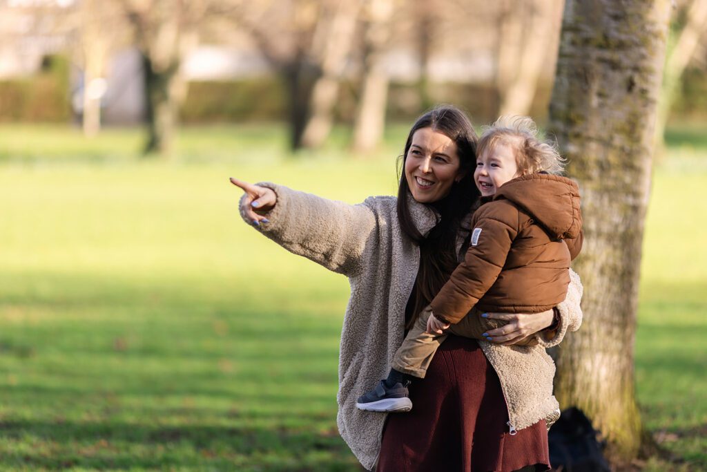mother holding son at the park in Dublin