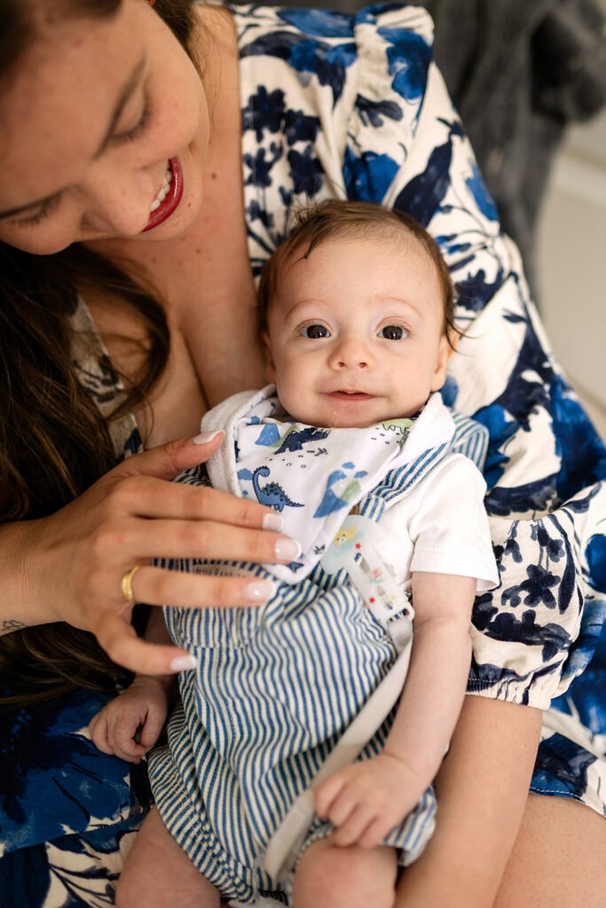 unposed newborn photography, baby in his mother's arms