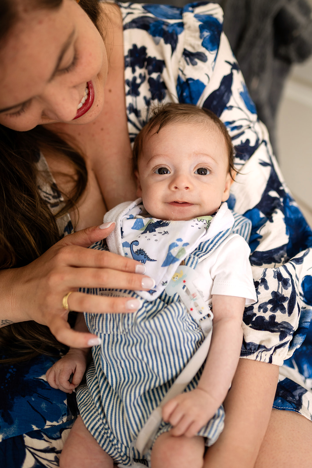 unposed newborn photography, baby in his mother's arms
