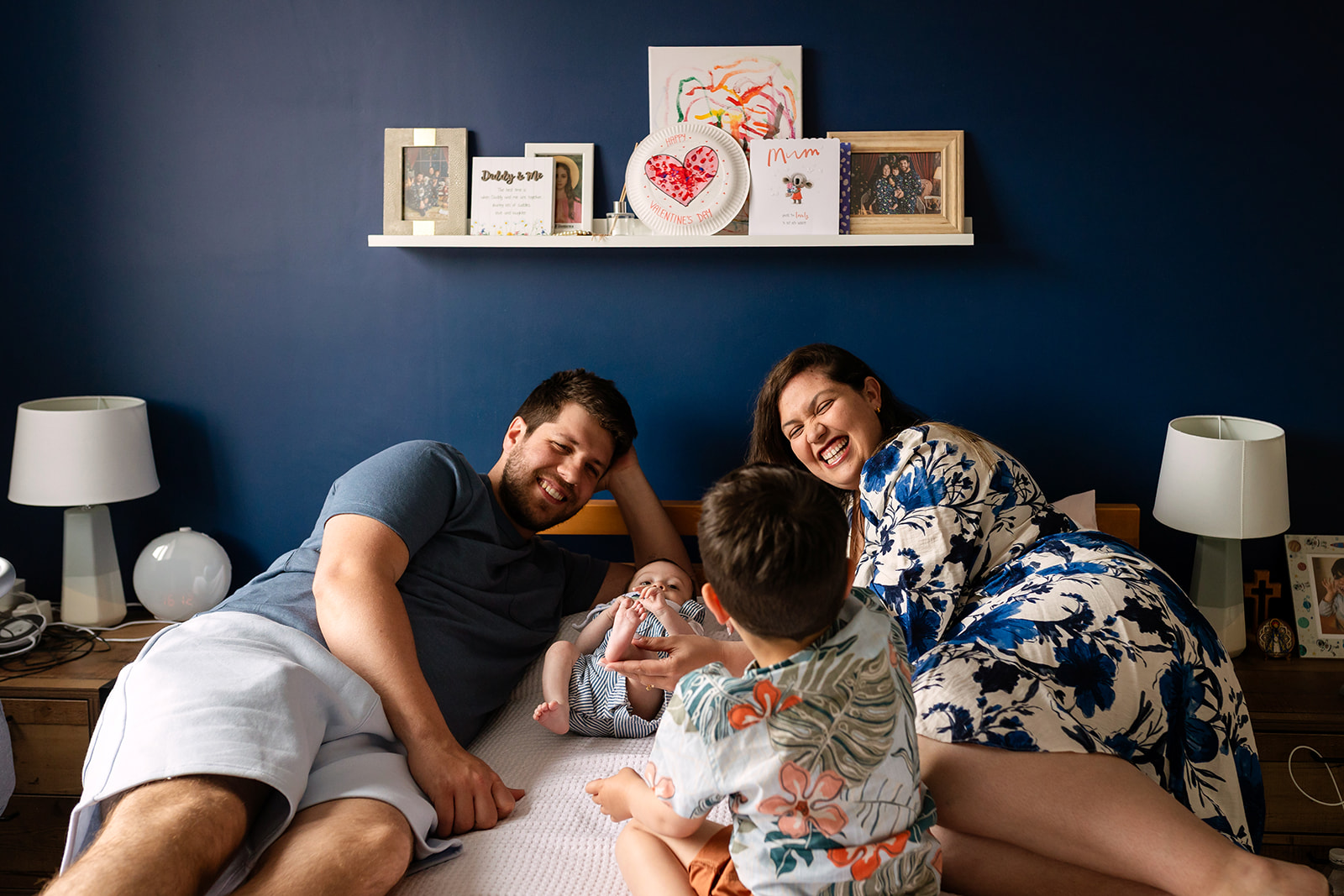 family playing on their bed What to expect during a Dublin family photo session