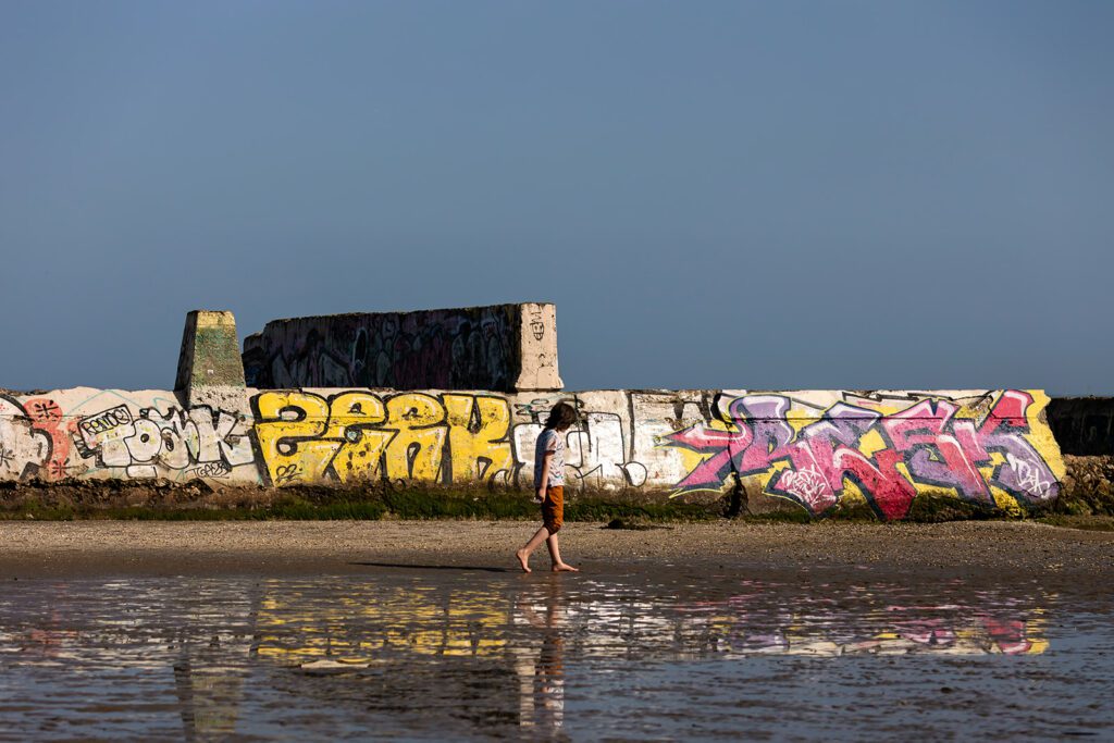 child walking along the beach in Dublin, Sandymount