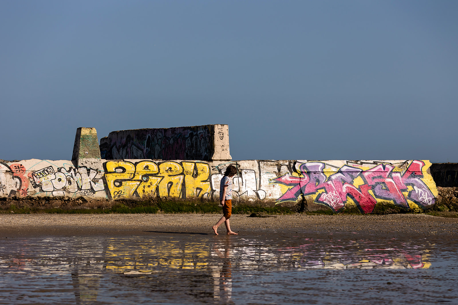 child walking along the beach in Dublin, Sandymount