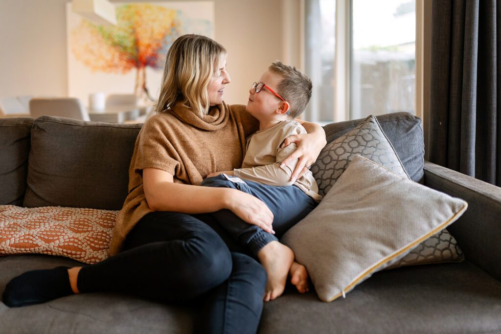 mother playing with her child at home