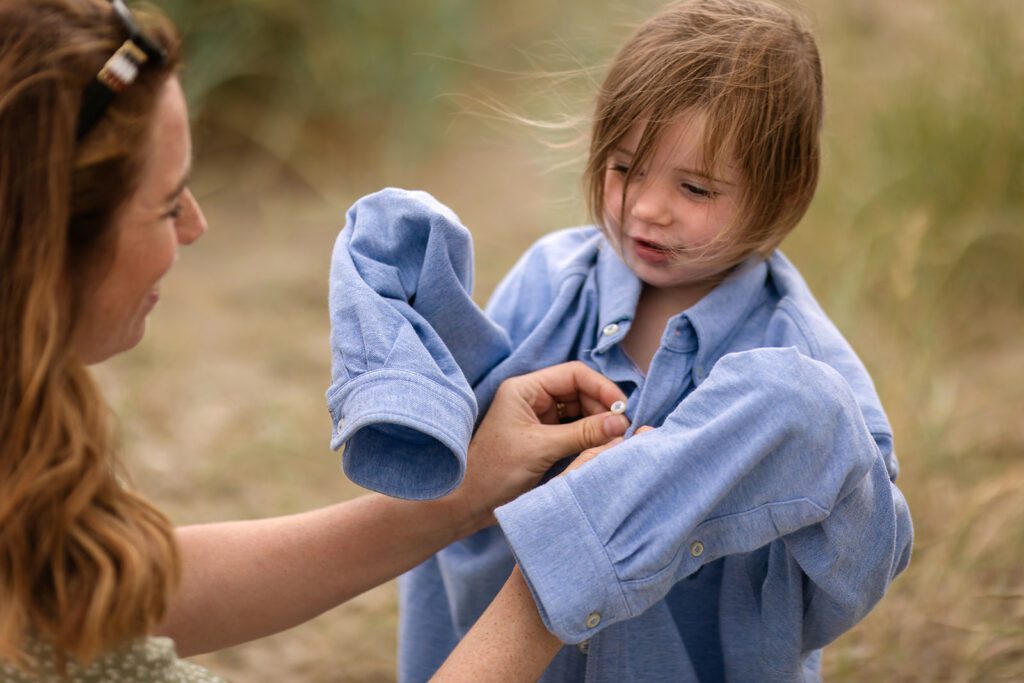 mum dressing up her kid