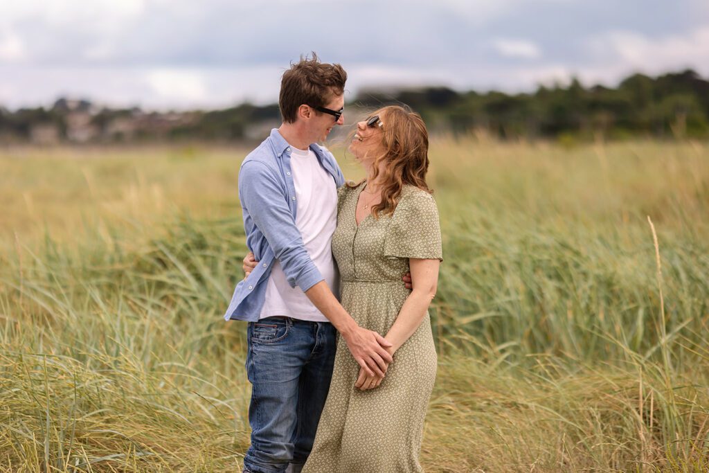 couple having a photoshoot at the beach