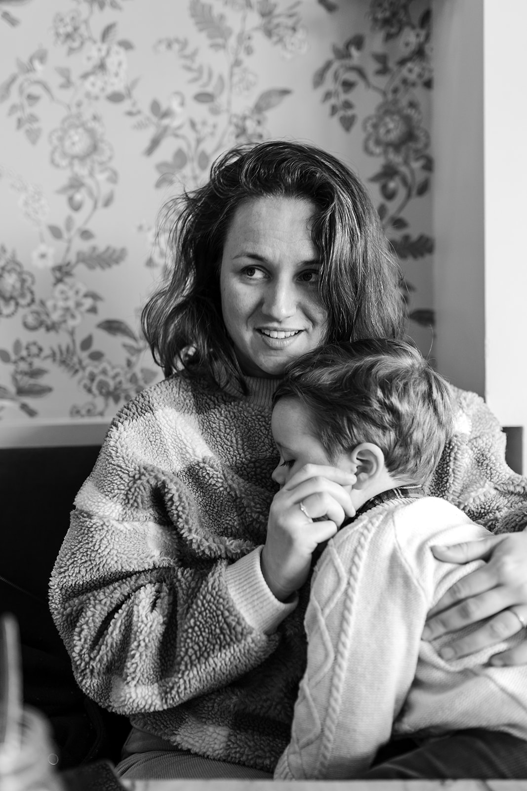 mother cuddling her toddler for a solo mum family photo session