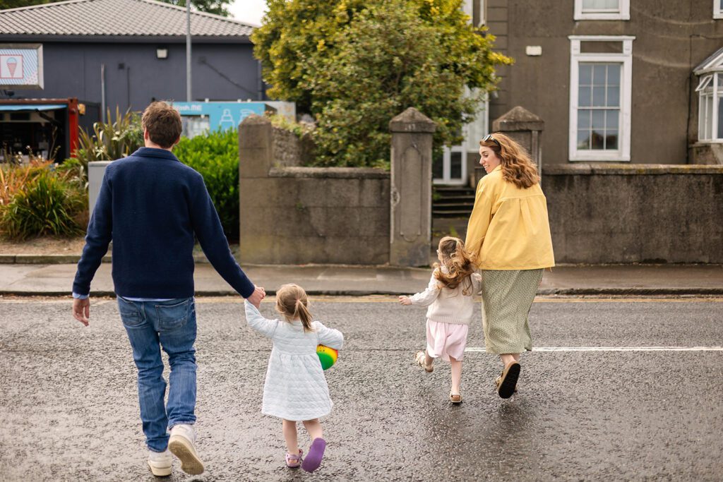family walking in the street in Dublin with kids, Stress-free family photography Dublin
