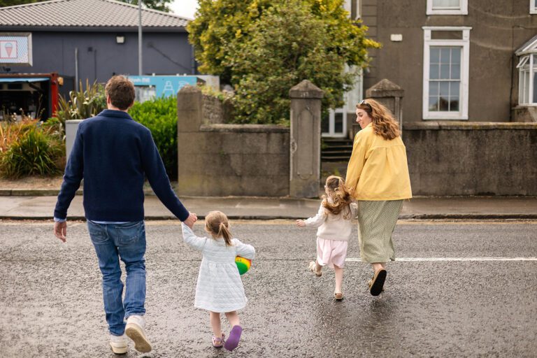 family walking in the street in Dublin with kids