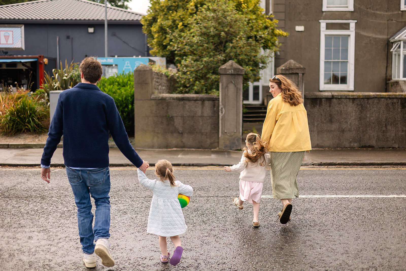 family walking in the street in Dublin with kids
