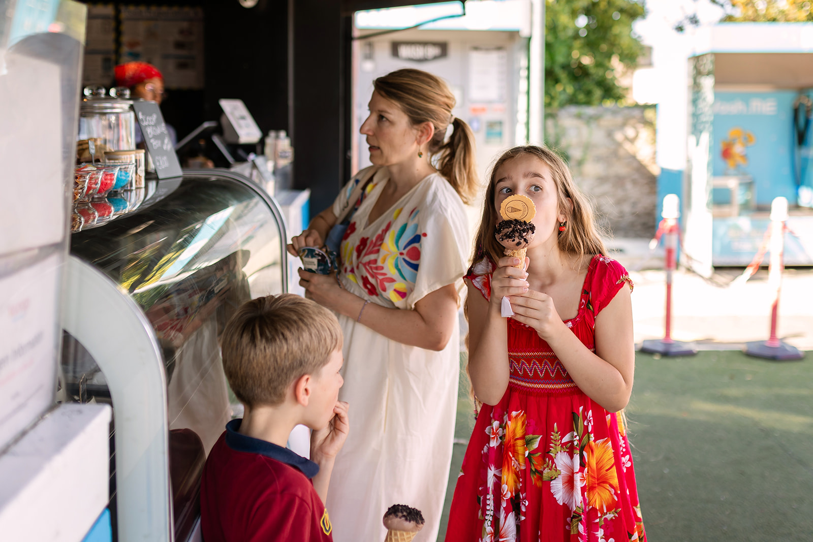 mother and kids buying ice cream in Sandymount