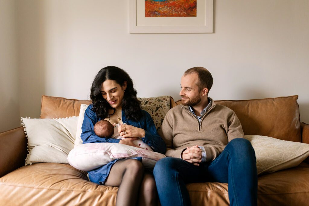 mom breastfeeding newborn during an in-home newborn photos in Inchicore Dublin 8