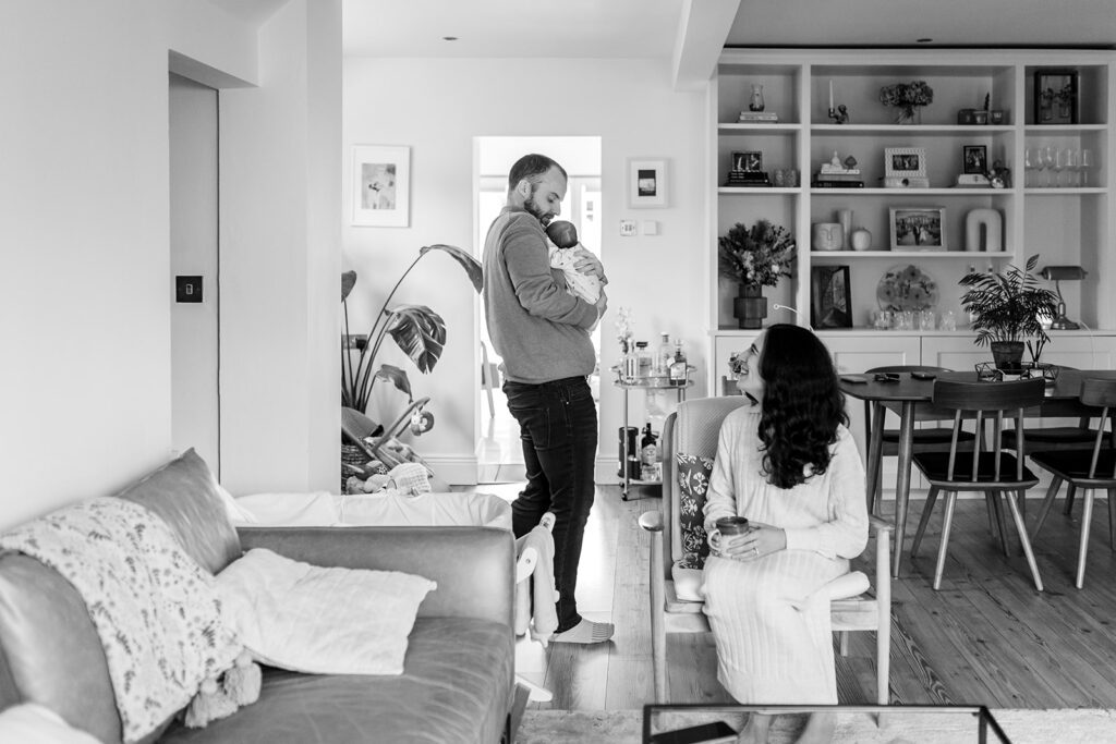 parents living their daily routine with a newborn at home