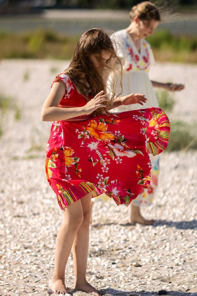 child having fun on the beach for a child-led photography session in Sandymount, Dublin