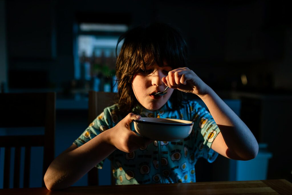 child eating cereals