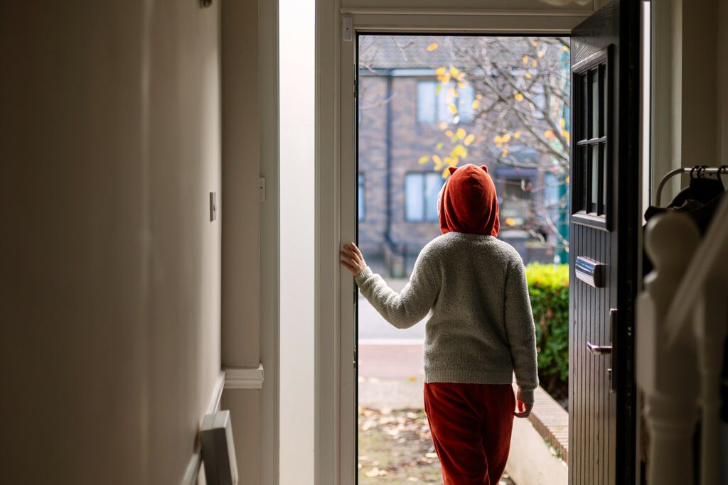 kid looking outside at his home, moving to Dublin with kids
